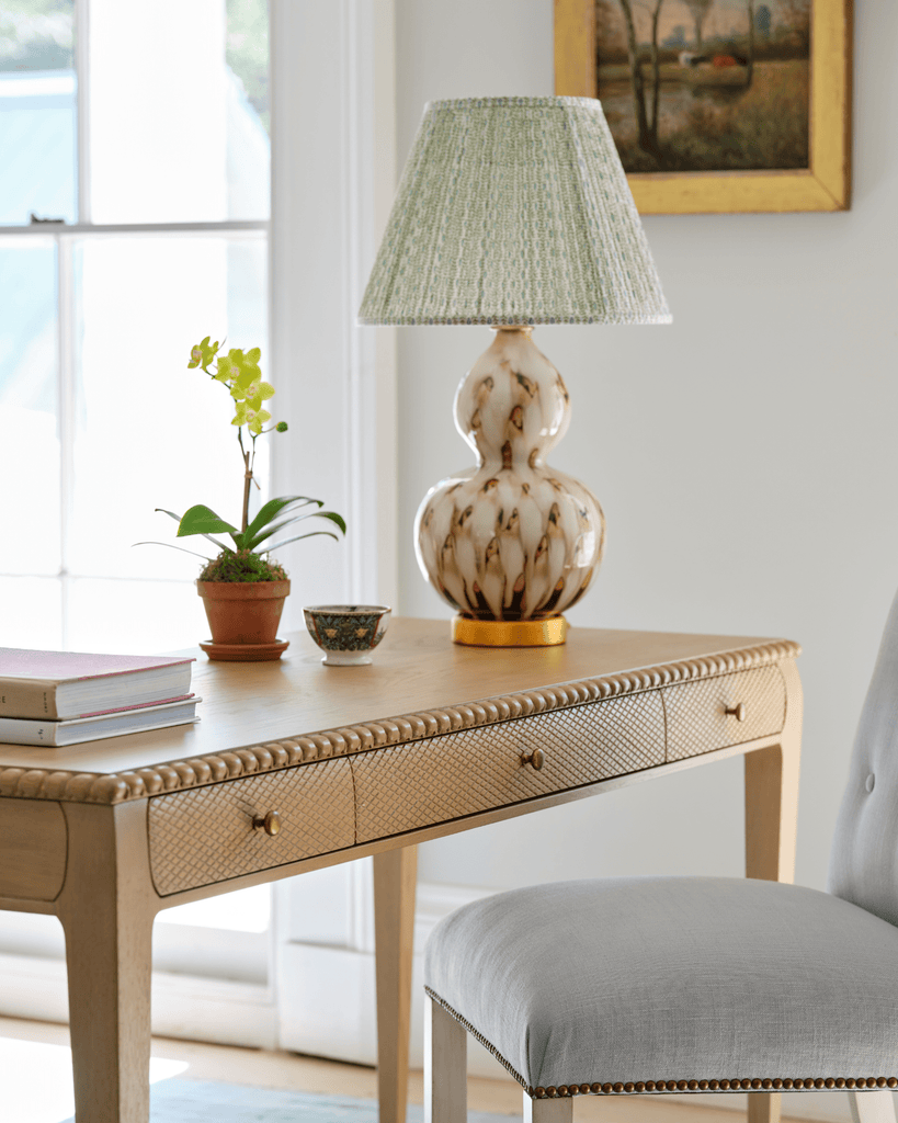 Light The Way | The right lamp does more than brighten a room; it sets the mood. Explore designs that bring both warmth and refinement to every corner | Shop Table Lamps