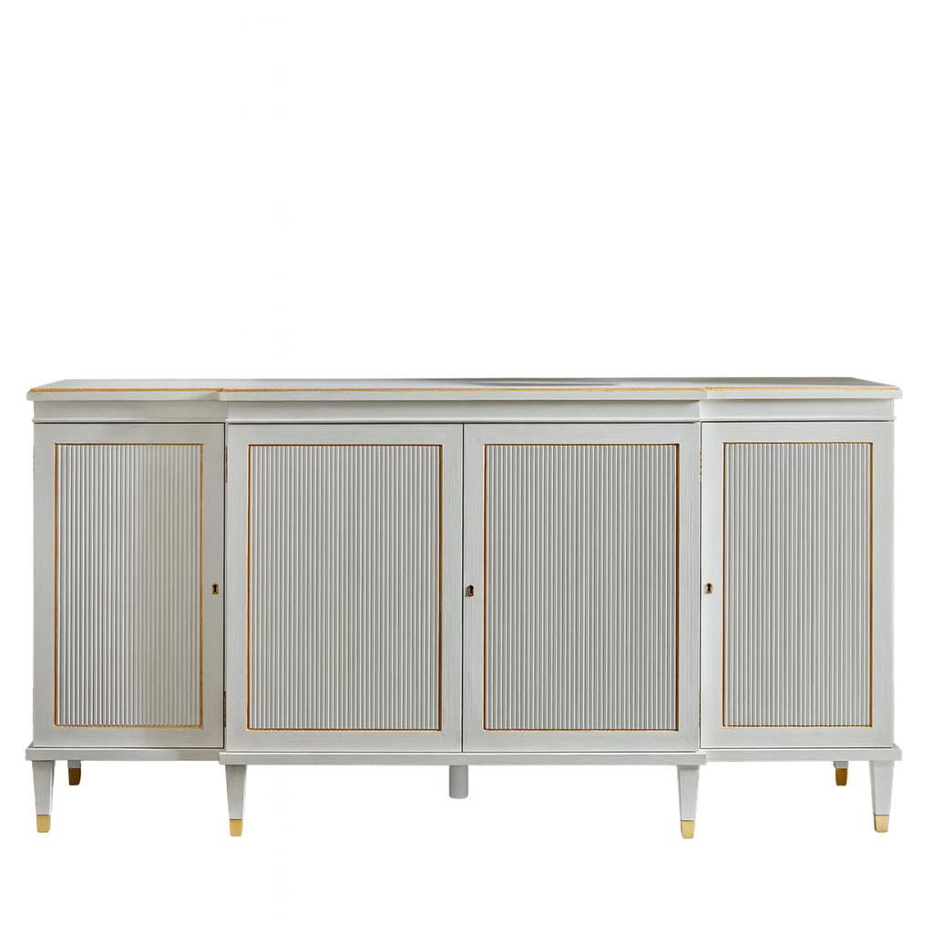White sideboard with gold accents on a white background - The Well Appointed House
